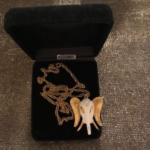 Brand new gold RAZZA necklace